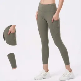 LL Yoga Pocket Leggings Snabba och gratis hög midja Capris Seamless Align Running Wave Point Byxor