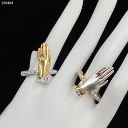 Nuovo stile Catena in oro / argento con pietre laterali Anelli a mano Teschio Scheletro Fascino Anello aperto per donne Uomini Festa amanti del matrimonio fidanzamento Gioielli punk Regali R2024-R21889