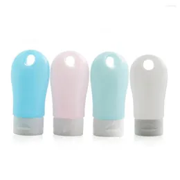 Lagringsflaskor 4 st 60 ml Travelflaskan läcksäker silikon påfyllningsbart pressbart rör med nyckelringskrok för kosmetisk toalettartikel schampo
