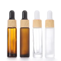100 st/parti 10 ml glas eterisk oljeflaska plast med träkorn täcker droppar flaska kosmetisk förpackning behållare