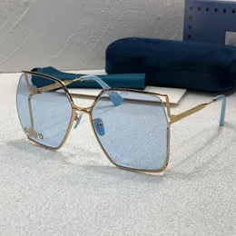 Designerskie okulary przeciwsłoneczne dla kobiet pusta metalowa rama 0187 Modna Outdoor UV Straszne promienie przeciwsłoneczne