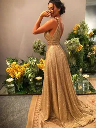 Sexig guld a-line formell prom klänning 2023 ärmlös spaghetti rem rygglös paljettkväll gala party klänningar mantel de soiree skräddarsydd