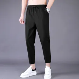 Męskie spodnie męskie cienkie spodnie Koreańskie trend Dziewięć prostych rur luźne lodowe jedwabne dresowe spodnie dla chłopców wiosna i jesień 230320