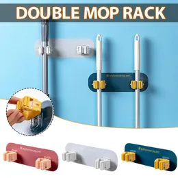 Hooks Rails Double Mop Wall Mounted Holder Borrfria självhäftande hängande hemkökverktyg Användbart garage Bad tvättstuga leveranser