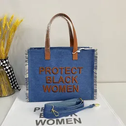 Bolsas de noite 2023 Designers Senhoras Compras Crossbody Bolsa Bolsa de lona de luxo Denim Protecte os negros ombro para mulheres W30CM