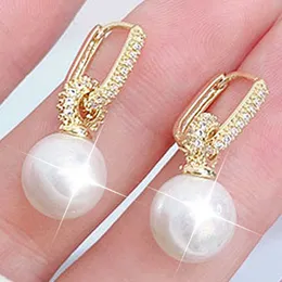 Fascino JUWANG forma rotonda romantico squisito orecchino di zircone per Lady Temperament Shine 14K oro reale lusso perla pendente orecchino tendenza G230320