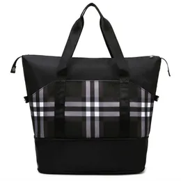 Duffle Bagss Kortavstånd resväska kvinnors bärbara affärsresa stor kapacitet lätt sport fitness litet bagage som väntar på leveranslagring 230316