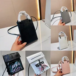 Shopping telefonhållare väska mini svart kvadrat läder axelpåsar designer två tunna runda handtag justerbar crossbody rem snap magnet stängning totes 2023