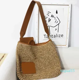 Designer-Summer High-capacity Straw Woven Bag One Shoulder Split Leather Holiday Portable Women's Bag Pastoral Woven Bag 230313