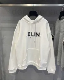 Herrtröjor tröjor designer hösten vinter ny svart vit rutig pil stift tryck huvtröja par hoodie kappa mode 10h