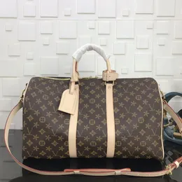 حقيبة القابض M41424 Keepall Woman Mens مصمم فاخر عبر أكياس السفر عبر الجسم محفظة في الهواء الطلق حقائب يدوية جلدية حقيقية تسير على الكتف حقيبة واق من الكتف