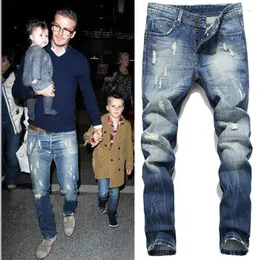 Мужские джинсы мода Beckham Hole Raked Hip Hop Men Men Slim Bunders Blothing вымытые винтажные карандашные джинсовые брюки Pantalones hombre