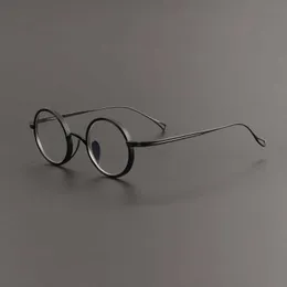 Lyxdesigner Nya män och kvinnors solglasögon 20% av Wannian GUI KMN122 Ultra-ljus Pure Titanium Glasses kan utrustas med runda anti-blå ljuram