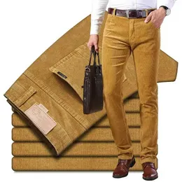 Мужские штаны 2021 Новые мужские вельветовые повседневные брюки бизнес -мода с твердым цветом эластичная регулярная подгоня
