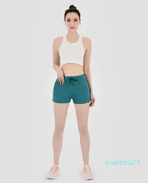 Kvinnor yoga shorts feminin casual formning outfits cinchable dragkord kör korta byxor damer sportkläder fast färg flickor övning 44 slitage