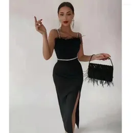 Vestidos casuais verão na moda da moda Black Sexy Spaghetti Strap penas