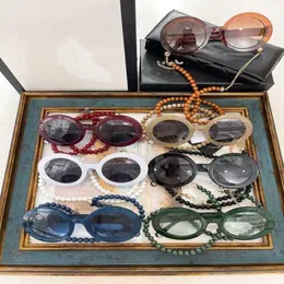 Occhiali da sole firmati di lusso di alta qualità con sconto del 20% su 23 occhiali con catena di perle pendenti tondi netti rossi, stesso stile 5489