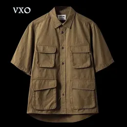 Mäns avslappnade skjortor 5/4 hylsa arbetsskjorta American-stil elastisk last kortärmad mäns retro utomhus multi-fickskjorta fyra ficktröjor w0328