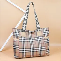 Nuevo 2023 Bolsas de diseñador de alta calidad Bolsos Bolso de mano Mujeres Moda de lujo Monedero de tejido Hombro Gran capacidad Bolsa de compras de lona