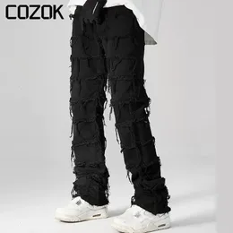 Jeans masculinos Retro Solid Color Tassel Tassel Straight Street High Street Ripped Hip Hop Baggy Tounters de jeans casuais 230330
