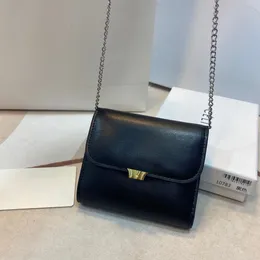WOC Small Sling påsar axel crossbody myntpåse handväska kalvskinn mönster lyxig designer handväska designer nyckelkeychain plånbok kvinnor plånbok 10.5 cm
