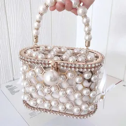 Torby wieczorowe luksusowe designerskie torebki Pearl Womens for Women Hollow Out Wedding Clutch Bag Rhinestone Metal 230427