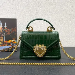 Роскошная дизайнерская сумочка DG Высококачественная кожаная крокодиловая картинка цепь на плечо модная металлическая сердечная сумка кросс -кусочка сумка женская мини -флип -тотация