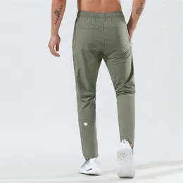 LL Sports Leisure Fitness Pants Men's Style High Elastic Breattable Loka Running Byxor snabba torra tröjor i lager