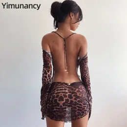 Abiti casual Yimunancy Stampa leopardata Backles Manica lunga Maglia primavera Halter Trasparente Sexy Club Vestidos 230503