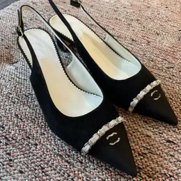 French high quality dress shoes 2023 fashion new rear empty trip strap chain baotou thick heel sandals lightweight and comfortable