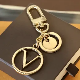 Alaşım Landards Luxury Designer Anahtar Zincirleri Üst Araba Anahtar Kez Çanta Asma Makinesi Moda Mektubu Anahtar Tedarik Kutusu