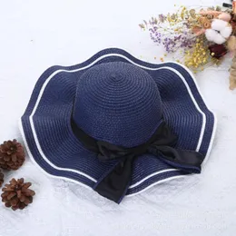 Szerokie brzegowe czapki anty-UV Składane zwinięte krawędź Lady Sun Hat Headwear Summer