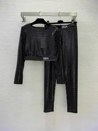 Conjuntos para mulheres roupas femininas calças de duas peças yoga sportwear moda logotipo webbing costura lantejoulas brilhantes estiramento fino ternos de duas peças roupas de grife