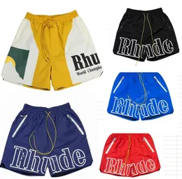 Diseñador Rhude Pantalones cortos para hombres Moda de verano Pantalones de playa Hombres Ropa de calle de alta calidad Rojo Azul Negro Púrpura Hombres sueltos Tamaño corto S-XL