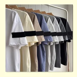 tişört moda erkek tasarımcı tshirts kısa kollu saf pamuk gevşek ve basit beyaz tees kol rozeti tee erkek düz renk tişört çok yönlü gündelik çift stil