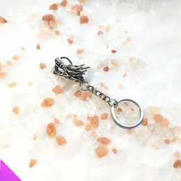 Nyckelringar Partihandel 10 Style Keychain 3D Amulet Pendant Man och kvinnlig nyckelkedja Small Commodity Gift Rostfritt stål