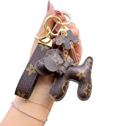 Tasarımcı Keychain Puppy Gerçek Kürk Top Kolyesi Ana Zincir Araç Kolye Metal Moda Kişiselleştirilmiş Yaratıcı Aksesuarlar