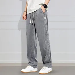 Jeans pour hommes hommes taille mi-haute taille élastique décontracté poches à cordon mince couleur unie Hip Hop droite jambe large pantalon en Denim