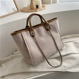 Simple Canvas Fashion Small Fragrance Chain 2021 New Handheld One Shoulder Bag factory outlet 70% di sconto su X54T