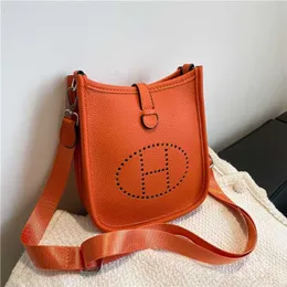 50% off factory online Texture Women's Bag 2023 New Family Small Mini Fashion Square Personalized One Shoulder Crossbody Hollow out Bucket