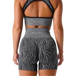 Yoga kläder nvgtn vild sak zebra sömlösa shorts spandex kvinnor fitness elastisk andningsbar hiplifting fritidsport som kör 230506