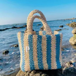 2023 Weave Straw Small Tote Beach Påsar Kvinnor Mens Summer Handväska Designer axelväska Luxurhelg Crossbody Lady Clutch Beach Hand Kopplingar