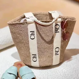 Designer Woody Tote Straw Basket Beach Bag Summer Cross Body Raffias Axel Bagagväska Purse Womans Mens Luxury Handväskor Koppling Stora Casual Canvas Shopping Påsar