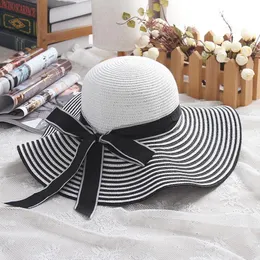 Chapéus de aba larga Chapéus de balde Moda HEPBURN Wind Wind preto branco listrado bowknot Summer Sun Hat Beautiful Women Women Straw Hat Large Brimed Hat 230511