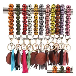 Chave de Wood Wood Bead Keychain com Tassel Principal Breads Bracelet Party Favor Favor Plaid Wooden Ring Board Keychains pendente Drop Del Dhbxj