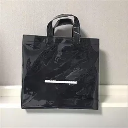 Designer- Paper PVC Shopping Bag Unisex Letter Casual Moda Moda Bolsa Sólida Designer Clear Beach Propertável Bolsas de Mulheres289c