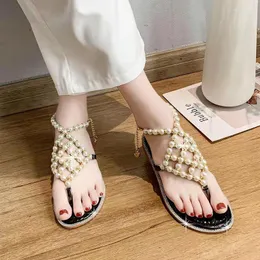 صندل لؤلؤة نساء أنيقة الصيف جميعها تطابق مع Thong Sandal Fashion جميلة ونسخة كورية حلوة صلبة