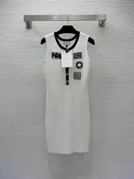 Elegante suéter feminino sem mangas malha lantejoulas crachá vestido único breasted senhoras vestido primavera verão