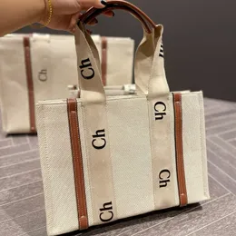 Nowe płótno torby designerskie damskie letnie torebki z paskiem na ramię plażowe portfele crossbody Projektanci zakupów