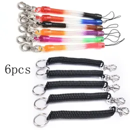 6pcs plástico preto bobina retrátil de mola de mola em espiral ChainChain Key Anel para homens Momenos Chaves -chaves Presentes